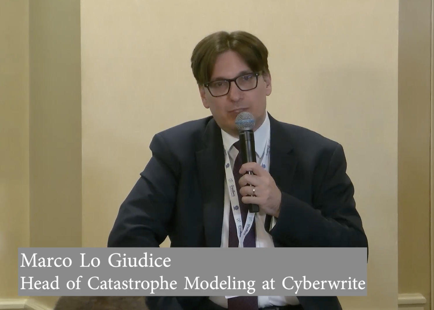Marco Lo Giudice speaking on cyber catastrophe modeling at Cyberwrite